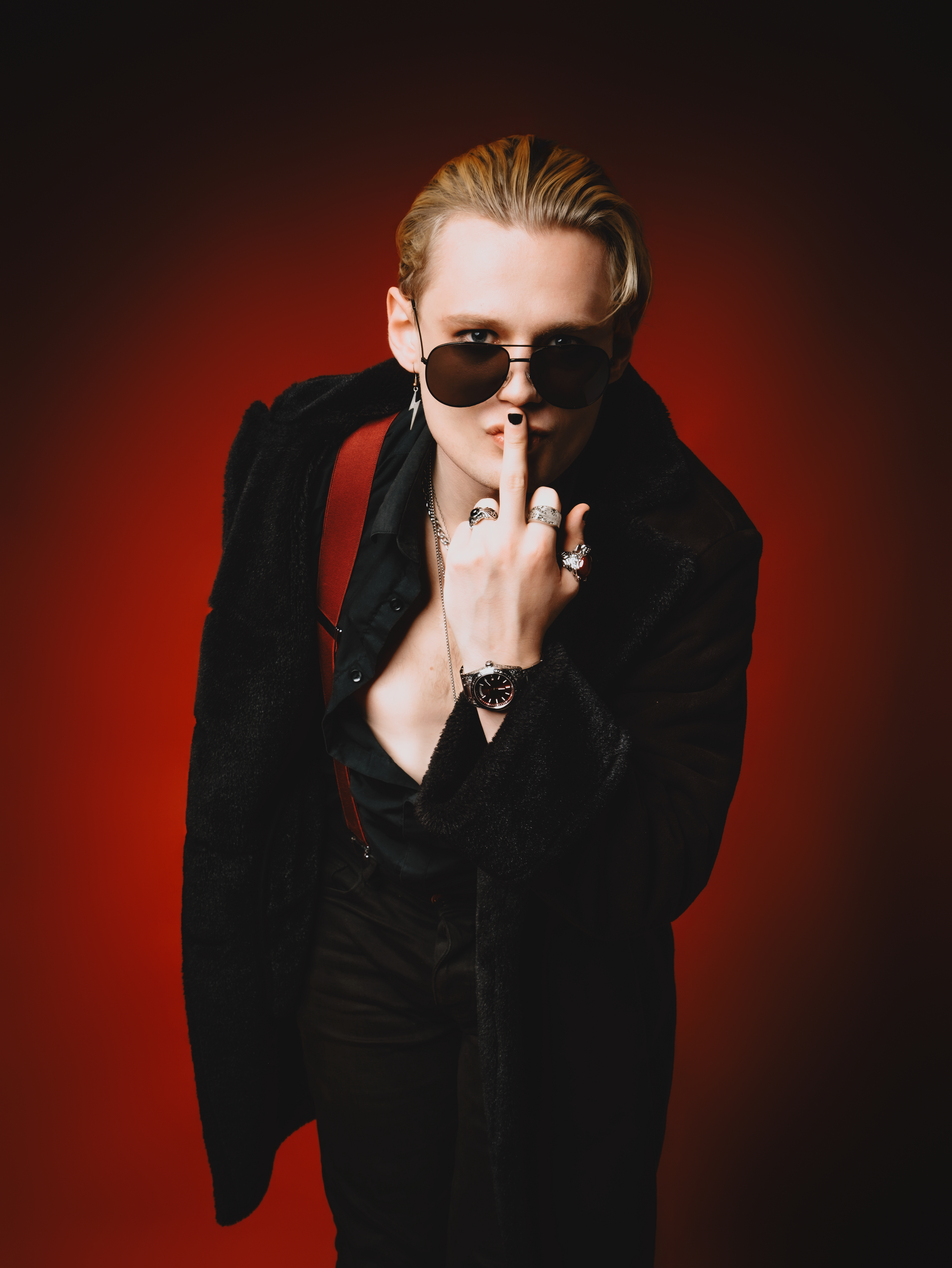 D.r.a.c.0 press photo with bass guitar